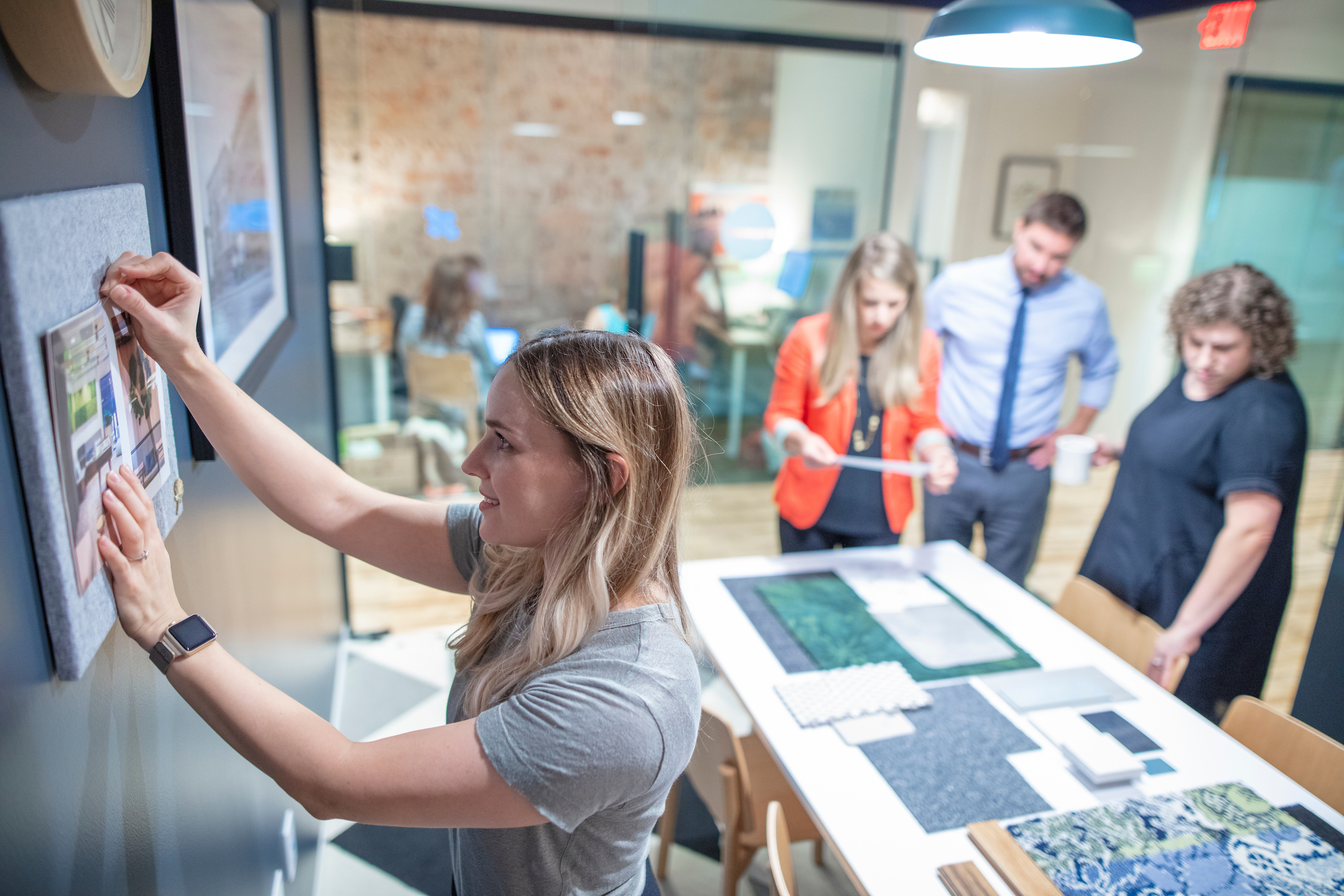 Gather Richmond Co-workers Walking Down Glass Hallway of Offices