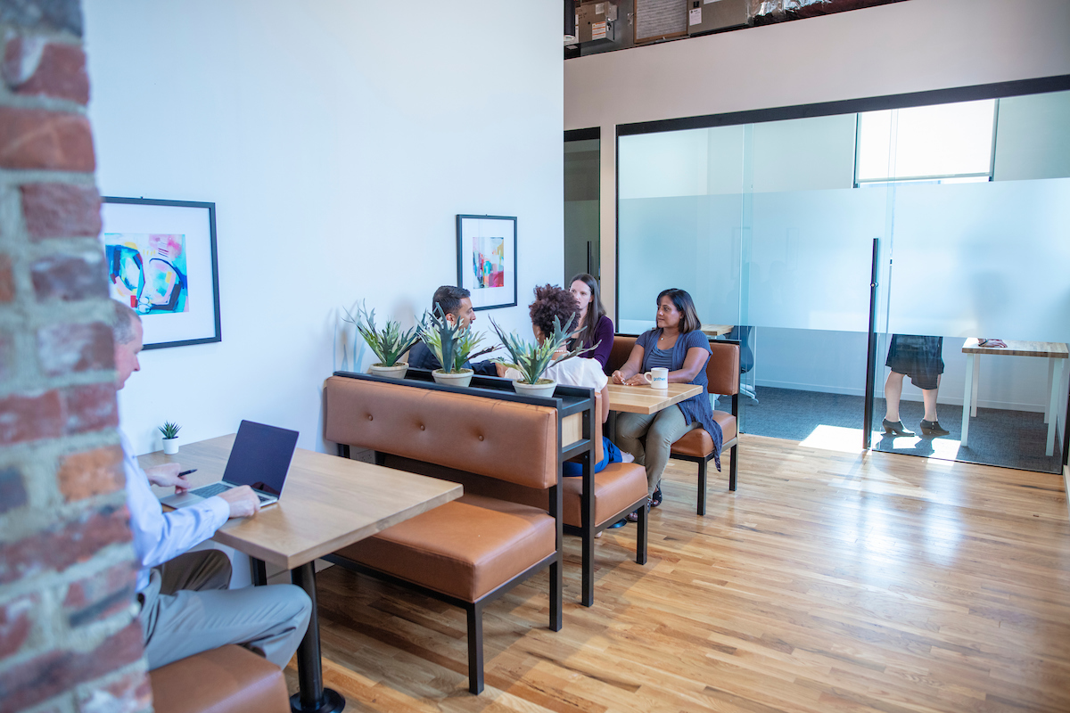 Community manager answering a member's questions