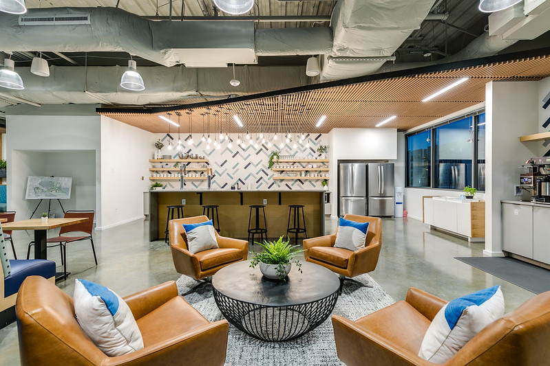 Gather Richmond Co-workers Walking Down Glass Hallway of Offices